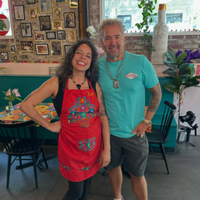 Smiling Situ Tacos owner and Guy Fieri