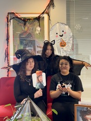 Special events members dressed in spooky outfits.