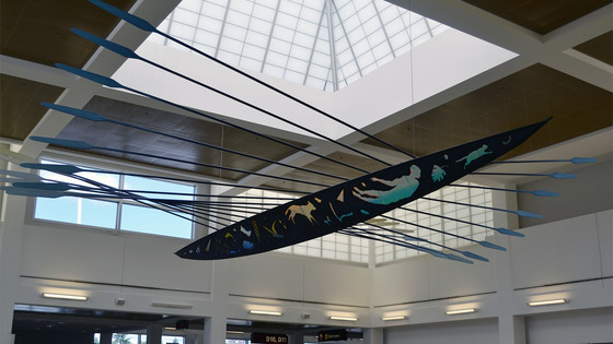 Indigenous peoples of the Northwest carved beautiful wood canoes, as shown here in the D Concourse of SEA Airport