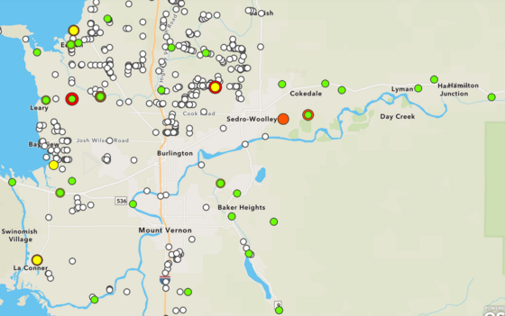 Map of water quality data in Skagit County with red, green and yellow dots representing bacteria levels.