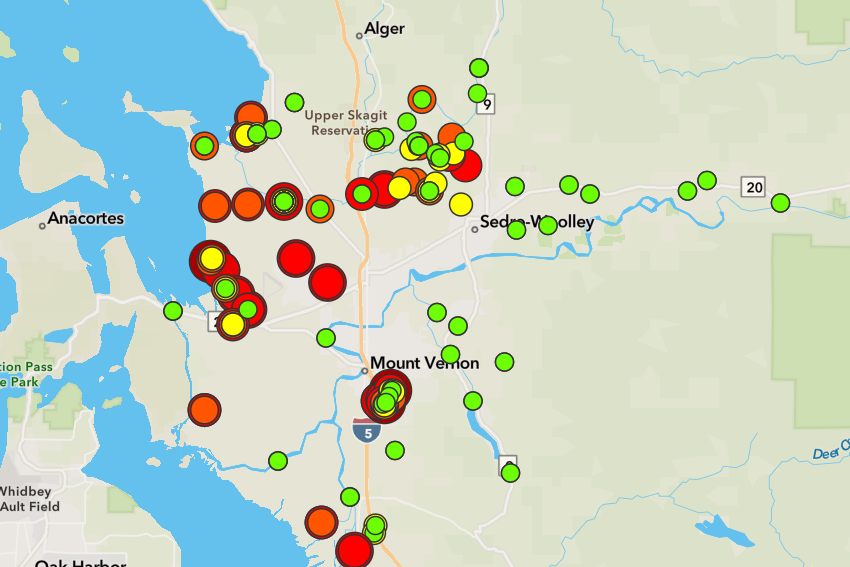 Map of water quality data in Skagit County with red, green and yellow dots representing bacteria levels.