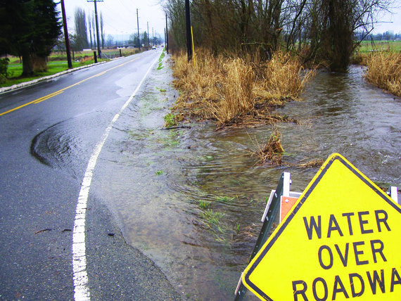 photo of water over roadway