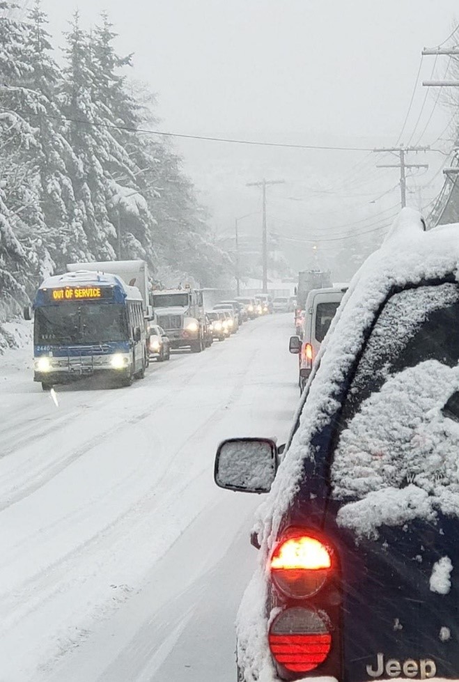 Photo of two-way traffic on snowy road in Snohomish County