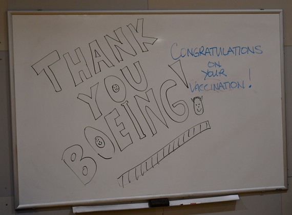 White board message at Boeing vax site on demobilization