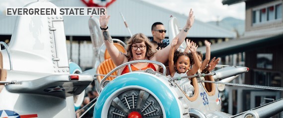 Photo of family on Evergreen State Fair Ride