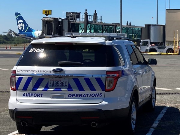 Airport operations vehicles with new striping