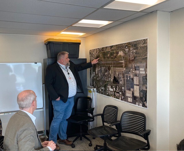 Paine Field Airport Director Josh Marcy showing Rep. Larsen the location of the future R&D Center. 