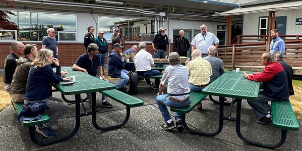 General Aviation pilots and tenants receive an update from Airport Director Joshua Marcy on July 17, 2023