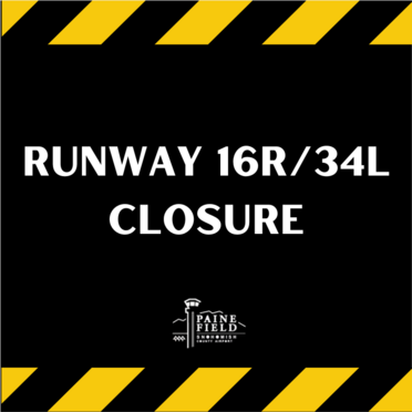 Main Runway closure with yellow and black caution stripes