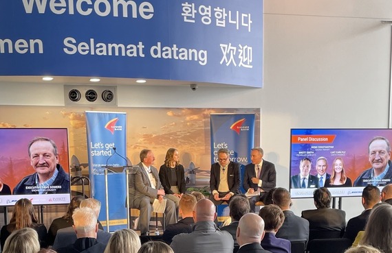 Dave Somers, Liat Carlyle, Brett Smith, and Dow Constantine on stage at County Update