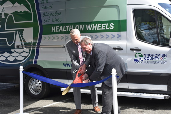 Executive Dave Somers and Health Department Director Dennis Worsham cut the ribbon for Health of Wheels in April 2025