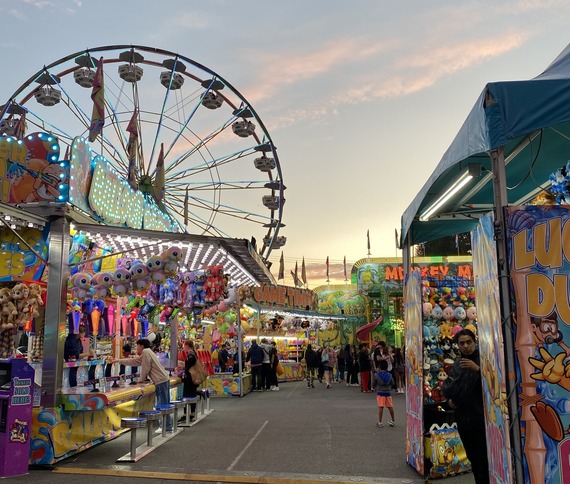 Carnival rides in the evening at the Evergreen State Fair