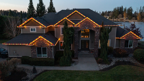 Image of a house with Christmas Lights on it - from valentine Roofing