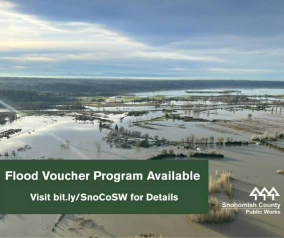 Image of flooding with text that says, "Flood voucher program available"