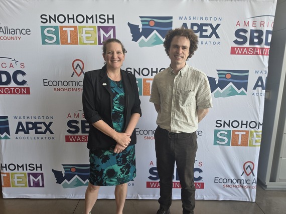 Andrew Moe standing with Councilmember Megan Dunn