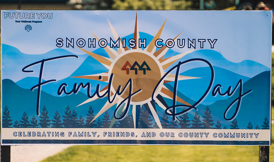 Snohomish County Family Day 2026 sign reading: celebrating family, friends and our county community.
