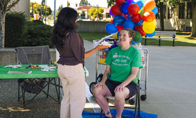 CM Dunn waits to have a pie thrown in her face at Family Day.