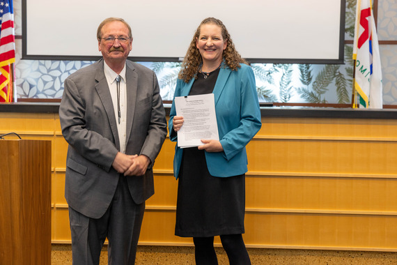 Snohomish County Executive Dave Somers and County Council Chair Megan Dunn pose for a photo after the budget address
