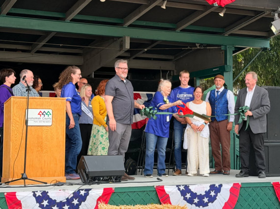 Fair honoree Sue Sanderlin-Berry cuts the ribbon on the 2026 Evergreen State Fair opening day.