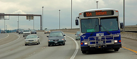 554 bus travels down the highway.