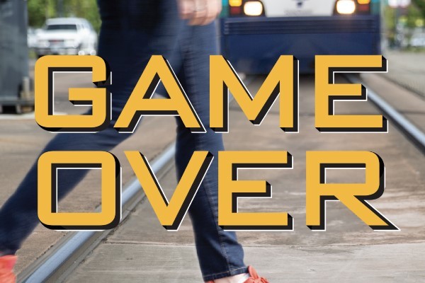 Game over text on photo graphic for safety campaign.