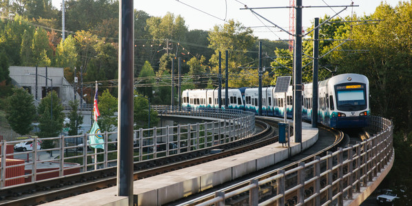 Link Light rail vehicle coming around a corner.