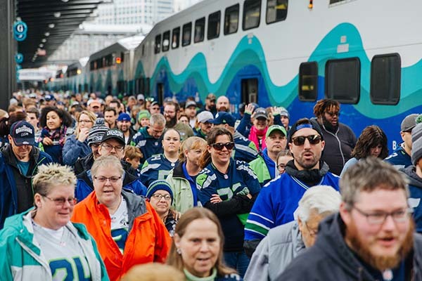 Sounder riders heading to a Seahawks game in 2018.