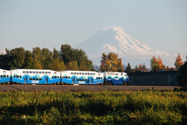 Picture showing a Sounder train with Mount Rainier in the background. 
