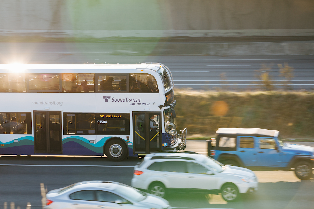 A double decker ST Express bus makes its way down I-5.
