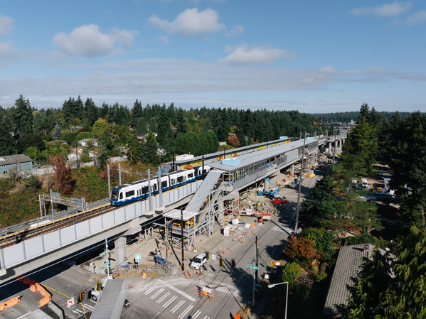 Aerial photo of Pinehurst Station on a sunny day with evergreen trees surrounding it.