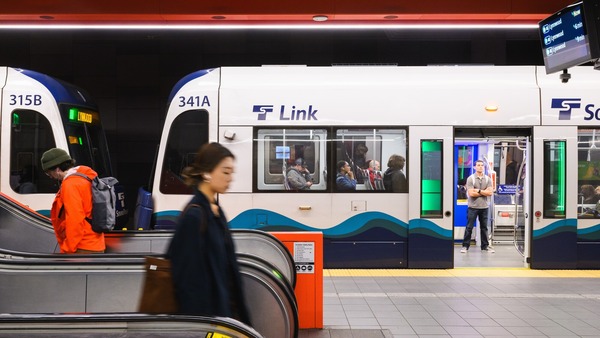 Commuter walking on the platform to ride the Link.