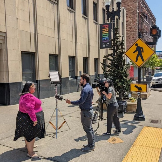 CM Diaz being interviewed for a news story about what Pride means to Tacoma