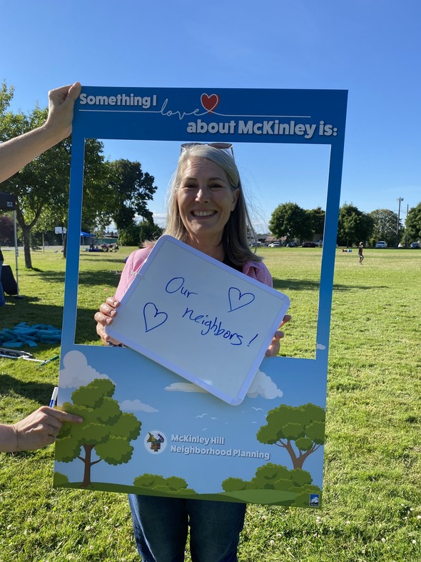 CM Ushka holding McKinley outreach sign