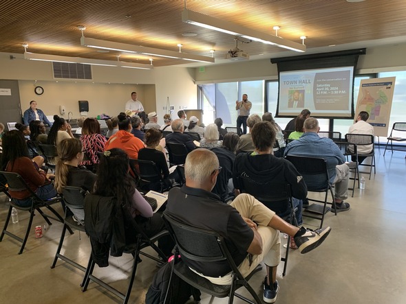 CM Bushnell speaking at his town hall