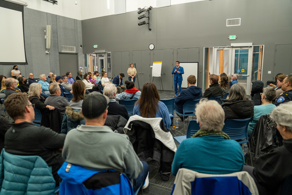 Pierce County Council Member Ryan Mello sharing his commitment to a regional approach to homelessness with the audience. 