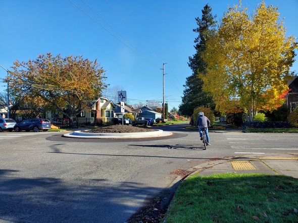 Bike riding around traffic circle at 37th and Tacoma Avenue South 