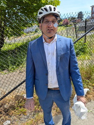 CM Sadalge wearing a helmet with cuts and bruises after a bike accident 