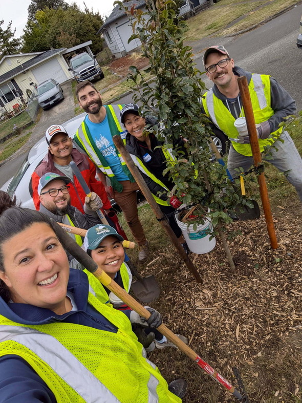 CM Bushnell and volunteers planting trees