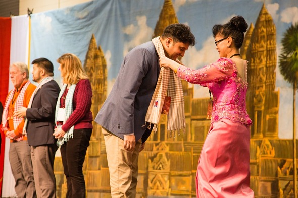 CM Sadalge onstage at the Asian Pacific Cultural Center’s New Year Festival