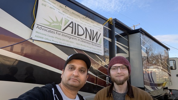 CM Sadalge and AIDNW staff outside the AIDNW Welcome Center