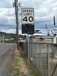40 mile per hour speed limit sign with a second sign covered up 