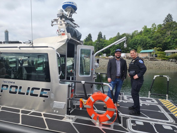 DM Bushnell on police boat 