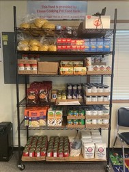 Shelves of a variety of non-perishable food.