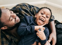 Dad and son laughing