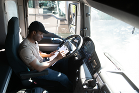 Man filling out paperwork 
