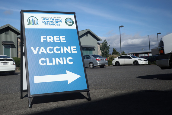 photo of a sign that reads "Free Vaccine Clinic"