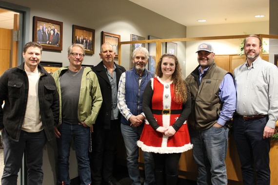 Councilmembers pose for a group photo in the Council Office library.