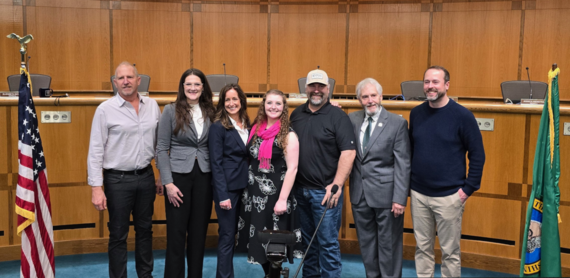 County Councilmembers pose for a group photo in front of the dais in Council Chambers following the Oath of Office ceremony.