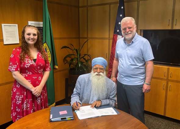 Comprehensive Plan signing with County Executive Satpal Sidhu, Council Chair Kaylee Galloway, and Planning Dept. Director Mark Personius