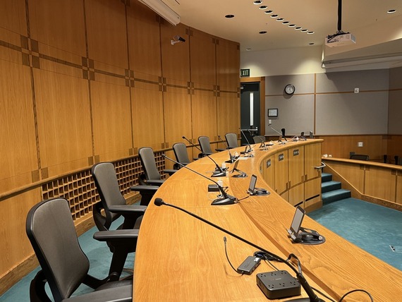 Dais with chairs at microphones